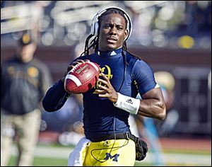 Michigan quarterback Denard Robinson has rushed for 4,395 yards.