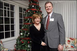 Paul and Karen David, chairmen of the Christ Child Society, during the group's Christmas party at the Toledo Country Club.
