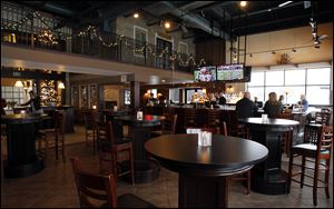 The McQuearys uncluttered the bar area, removing sports attire and some of the televisions that were added in the Admiral’s American Grill era.  