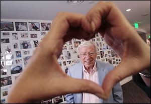 Neil Warren, eHarmony founder, president and chairman of the board poses for a portrait in their Santa Monica, California office.