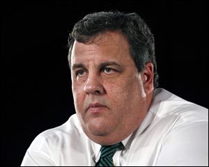 New Jersey Gov. Chris Christie listens to a question in Belmar, N.J. 