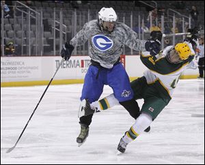 Anthony Wayne’s Cal Johnson, left, collides with Clay's Devin Gabella. Johnson has 10 goals and 17 assists.
