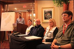 Shell Oil incident commander Susan Childs, second from right, answers a question about the Monday night grounding of the Shell drill ship Kulluk at a press conference at the Mariott Hotel in Anchorage, Alaska.