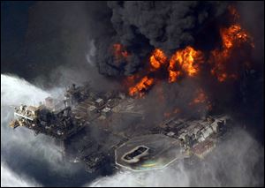 A scene in April, 2010 of the Deepwater Horizon oil rig burning in the Gulf of Mexico. Transocean Ltd. owned the drilling rig.