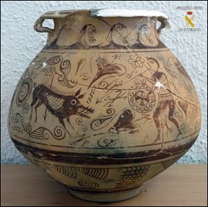 In this picture released by the Spanish Interior Ministry,  a very rare vase from late second century BC that was seized by police after it was found in an antique shop in the town of El Campello, eastern Spain.  