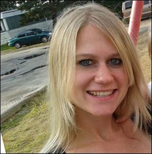 Rachel Kominek, 26, of Toledo, was pronounced dead at the scene Thursday.