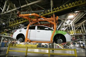 A Buick Verano moves along the line at Orion Assembly plant in Orion Township, Mich. Nearly four years after GM filed for bankruptcy protection, the automaker is building the Verano and the Sonic, the best-selling subcompact car in the nation. It's a vehicle no one thought could be made profitably in the U.S., by a company that few people thought would last.