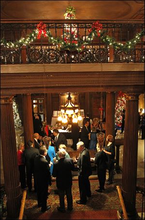 Party goers celebrate at the Toledo Club for New Year's Eve.