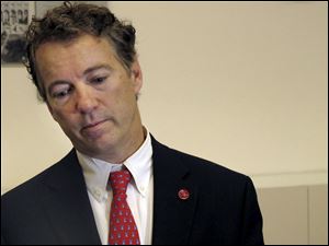 U.S. Sen. Rand Paul (R., Ky.) pauses during a press briefing at a hotel in Jerusalem, today. In his first visit to Israel, Paul called for a gradual reduction of American foreign aid. 