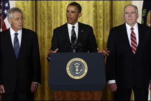 President Obama announces that he is nominating Deputy National Security Adviser for Homeland Security and Counterterrorism, John Brennan, right, as the new director of the CIA; and former Nebraska Sen. Chuck Hagel, left, as the new Defense Secretary.