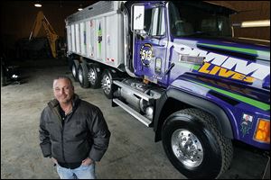Tom Wylie, owner of Wylie & Sons Landscaping in Perrysburg Township, completed the project in time for Christmas as a present to his son Tommy, Jr., who was killed in an accident in June. The ‘Crazy Plum Purple’ paint on the truck was the closest match to his son’s Kawasaki racing color.