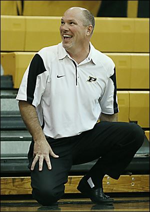 Coach Todd Sims has seen his team start with 11 straight wins. Perrysburg is ranked No. 6 in Ohio in Division I.