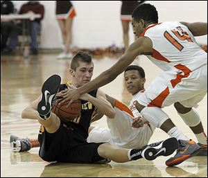 Northview’s Jeff Czerniakowski tries to keep the ball from Southview’s Brandon Stewart, 14, during the game at Southview in Sylvania.