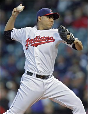 Cleveland Indians' Jeanmar Gomez pitches against the Chicago White Sox during a baseball game in Cleveland. The Pittsburgh Pirates have acquired Gomez from the Cleveland Indians in exchange for minor league outfielder Quincy Latimore.
