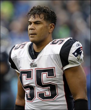 New England Patriots' Junior Seau watches during an NFL football game against the Seattle Seahawks in Seattle. Seau, one of the NFL's best and fiercest players for nearly two decades, had a degenerative brain disease when he committed suicide.
