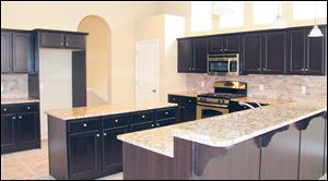 This large, bright kitchen is a cook's dream, with miles of counter space and storage.