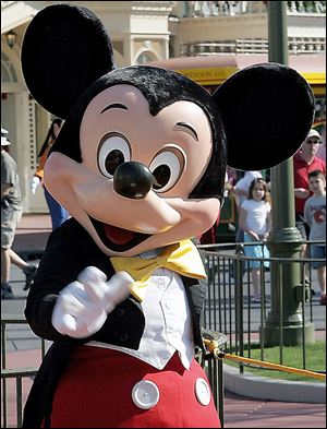 A character, such as Mickey Mouse, can interact with patrons in a more personal way through the MyMagic+ band. Disney is aware of the privacy concerns; a parent must opt-in first.