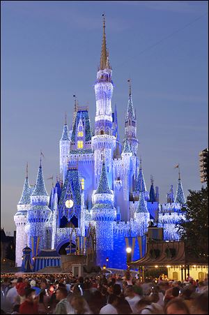 The iconic Cinderella Castle at Disney World in Florida glistens with 200,000 lights. Disney is trying to enhance its visitors' experience at the theme park and collect information on how the patrons use the park.