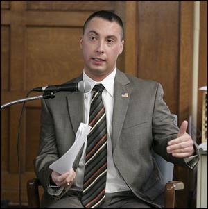 Ottawa Hills police officer Thomas White testifies during his trial in Lucas County Common Pleas Court in Toledo, on Thursday, May 13, 2010. 