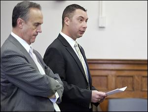 In 2010, Thomas White, right, with attorney Jerry Phillips, made a lengthy statement before being sentenced by Judge Gary Cook in Lucas County Common Pleas Court.  White, a former Ottawa Hills police officer, was sentenced to 10 years in prison.