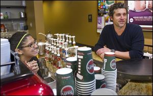 Patrick Dempsey's investment group has won the bid to purchase Tully's Coffee. 