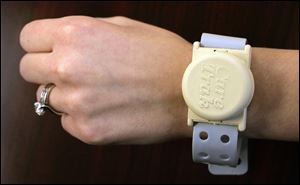 The electronic tracking service will help track Alzheimer's patients and others. The wristwatch-style FM transmitters send signals that can be picked up by receivers three or more miles away. 