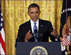 President Obama speaks about the debt limit in the East Room of the White House Monday.