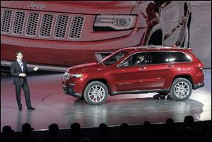 Jeep President and CEO Mike Manley speaks about the 2014 diesel Jeep Grand Cherokee at the North American International Auto Show in Detroit.
