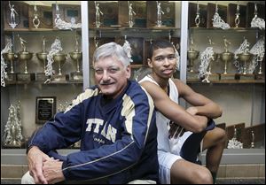 Ed Heintschel, in his 34th season at St. John’s coach, is one victory away from his 600th career win. Titans senior Marc Loving is 26 points away from setting the school career scoring record held by B.J. Raymond. St. John’s plays Friday against Central Catholic.