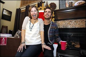 Josie Langsdorf, a Monclova Township woman with terminal cancer, sits on Scott Disick's lap on the throne made for him. The TV personality’s own Rolex watch, a gift,  graces Ms. Langsdorf’s wrist. 