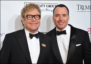 Sir Elton John, left, and David Furnish