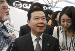 Wang Xia, president of the Guangzhou Automobile Group, attends the North American International Auto Show in Detroit. 