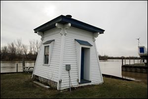 Darrell Brand, owner of Brands' Marina, planned to give Port Clinton an old lighthouse. So far, an agreement has been elusive on where it would be placed.