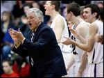  St. John's coach coach Ed Heintschel encourages his team en route to his 600th victory. He is now 600-189 in his career.