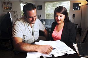 Richard and Susan Mallek, right, are first time homebuyers who expect to close on their new Boynton Beach home at the end of the month. Before the couple, who now live in Delray Beach, Fla., began their search last summer, they studied a homeowner's guide to buying real estate.