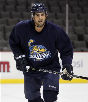 Toledo Walleye hockey player Wes O'Neill skates during training camp at the Huntington Center in Toledo before the season.