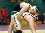  Matt Stencel of Clay controls Kadin Llewellyn of Perrysburg in the 182-pound championship match at the Michael Casey Memorial Classic wrestling tournament at Clay. Stencil pinned the top-seeded Llewellyn.