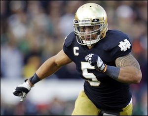 Notre Dame linebacker Manti Te'o chases the action during the second half of an NCAA college football game against BYU in South Bend, Ind. 