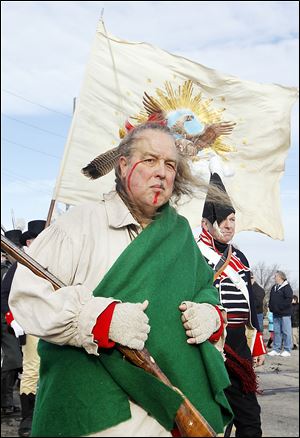 Rusty Cottrel of Springfield, Ohio, who is part Shawnee, dresses as a Peckuwe Shawnee Native American. 