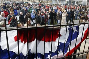 A crowd, some in period dress, gathers at the River Raisin National Battlefield Park Visitor Center during the 200th anniversary of the Battles of the River Raisin in Monroe.