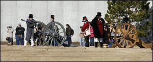 A crew reloads during a tactical demonstration on part of the battlefield near  the Monroe Multi-Sports Complex. About 300 re-enactors from several states and Canada helped mark the bicentennial.