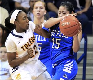 UT's Andola Dortch, who had 20 points, guards Buffalo's Margeaux Gupilan in Saturday's game at Savage Arena. The Rockets improved to 15-2, 3-1 in the Mid-American Conference.
