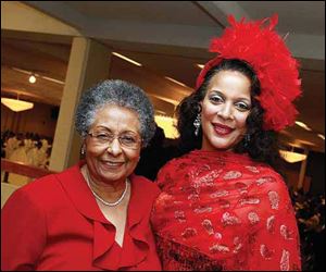 Wilma Brown, left, and Denise Blackpoon at the 48th Annual Debutante cotillion presented by the Toledo Club of the National Association of Negro Business and Professional women's Clubs, Inc. at Stranahan Great Hall.