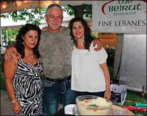 Karyn and Labib Hajjar, here with their daughter Marie Hajjar Russel, right, are among the many community leaders who put in much time and effort to benefit the area.