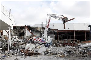 In 2011, Billy Paxton, owner of Paxton Demolition, tore down part of the cinema on Secor Road. Two years later, plans are said to be coming together for a $25 million hotel and retail project on the site.