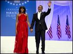  President Obama and first lady Michelle Obama arrive to dance together at an Inaugural Ball Monday night.