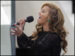  Beyonce performs the National Anthem at the ceremonial swearing-in for President Barack Obama at the U.S. Capitol during the 57th Presidential Inauguration.