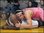  Clay's Eddie Silva, right, controls Central Catholic's Chris Norwood. Silva, a 195-pound senior, is 25-5 this season.