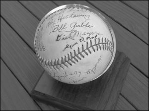 The signature of Dick Meyers is one up from the lower seam on this baseball, autographed by members of the 1948 Zanesville Dodgers.