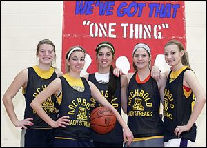 Archbold is looking to repeat as Northwest Ohio Athletic League champion with, from left, Cassidy Wyse, Taylor Coressel, Darian Oberlin, Jesse Fidler, and Hannah Hesterman. The Blue Streaks are 14-1 and ranked No. 2 in Ohio in Division III.